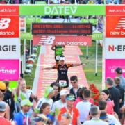 Teresa Theaker Finishing a Triathlon